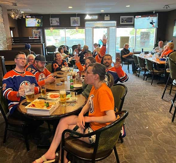 Dining room at Capital Pizza & Steak House in Belle Rive, North Edmonton, set for pizza and steak dinners